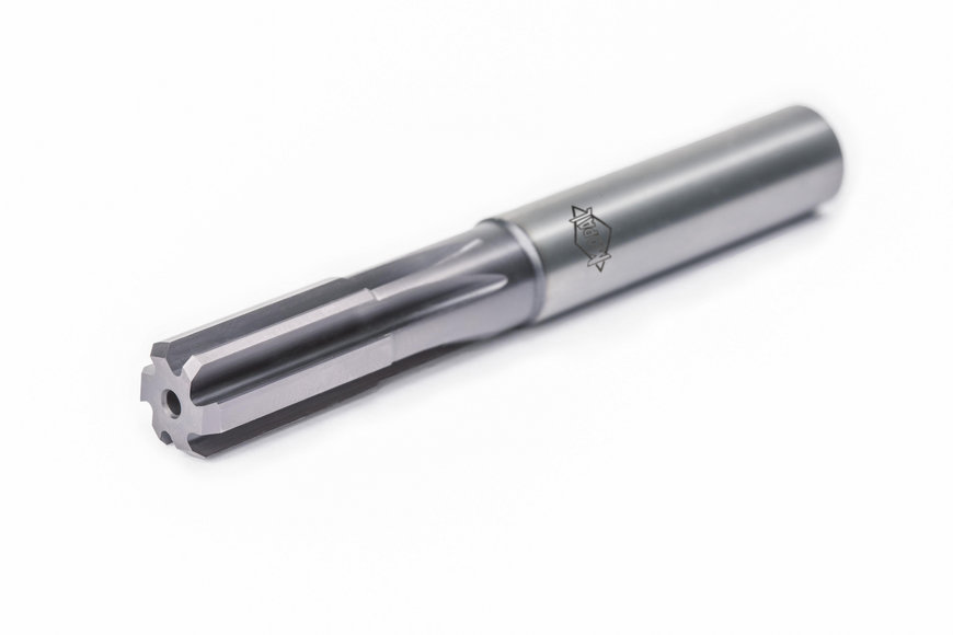 One tool for reaming both through bores and blind bores